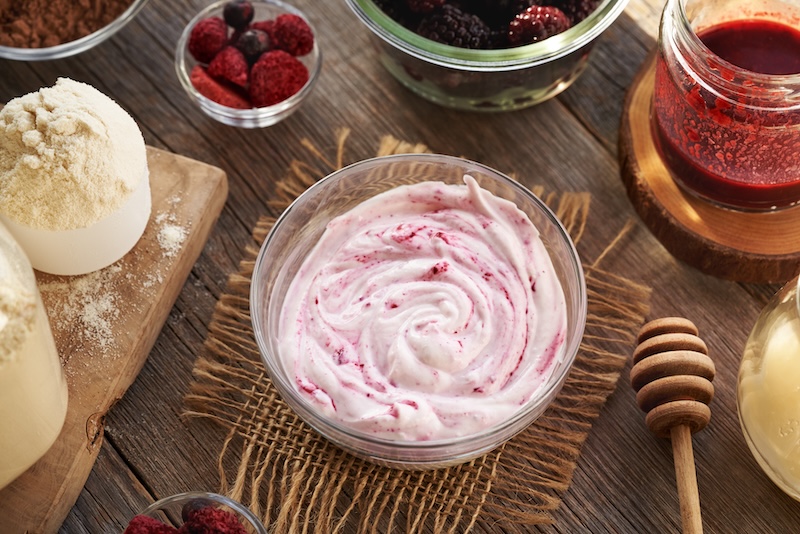 Creamy protein yogurt with warm berries & honey